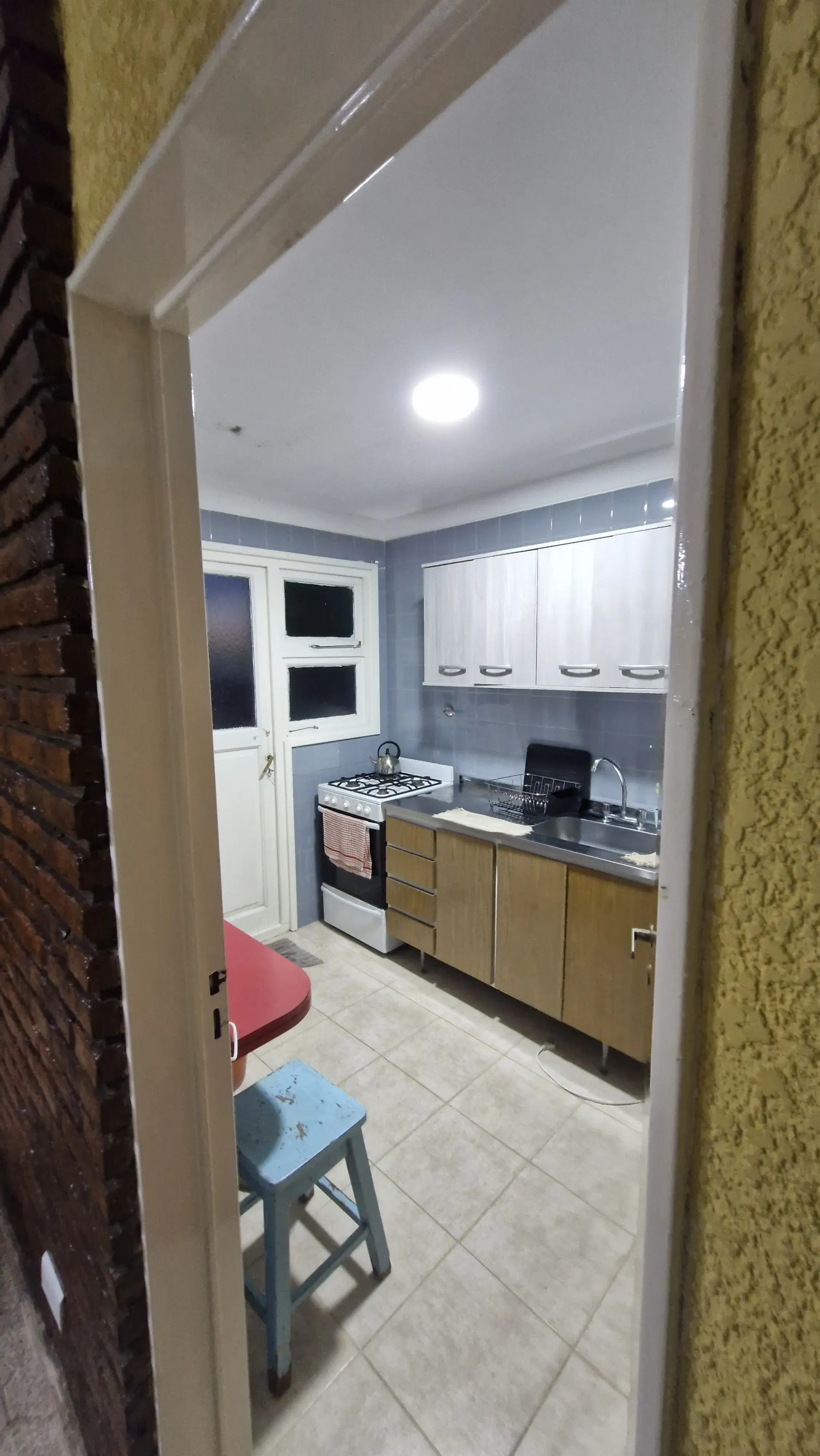 Cocina y balcón lavadero
